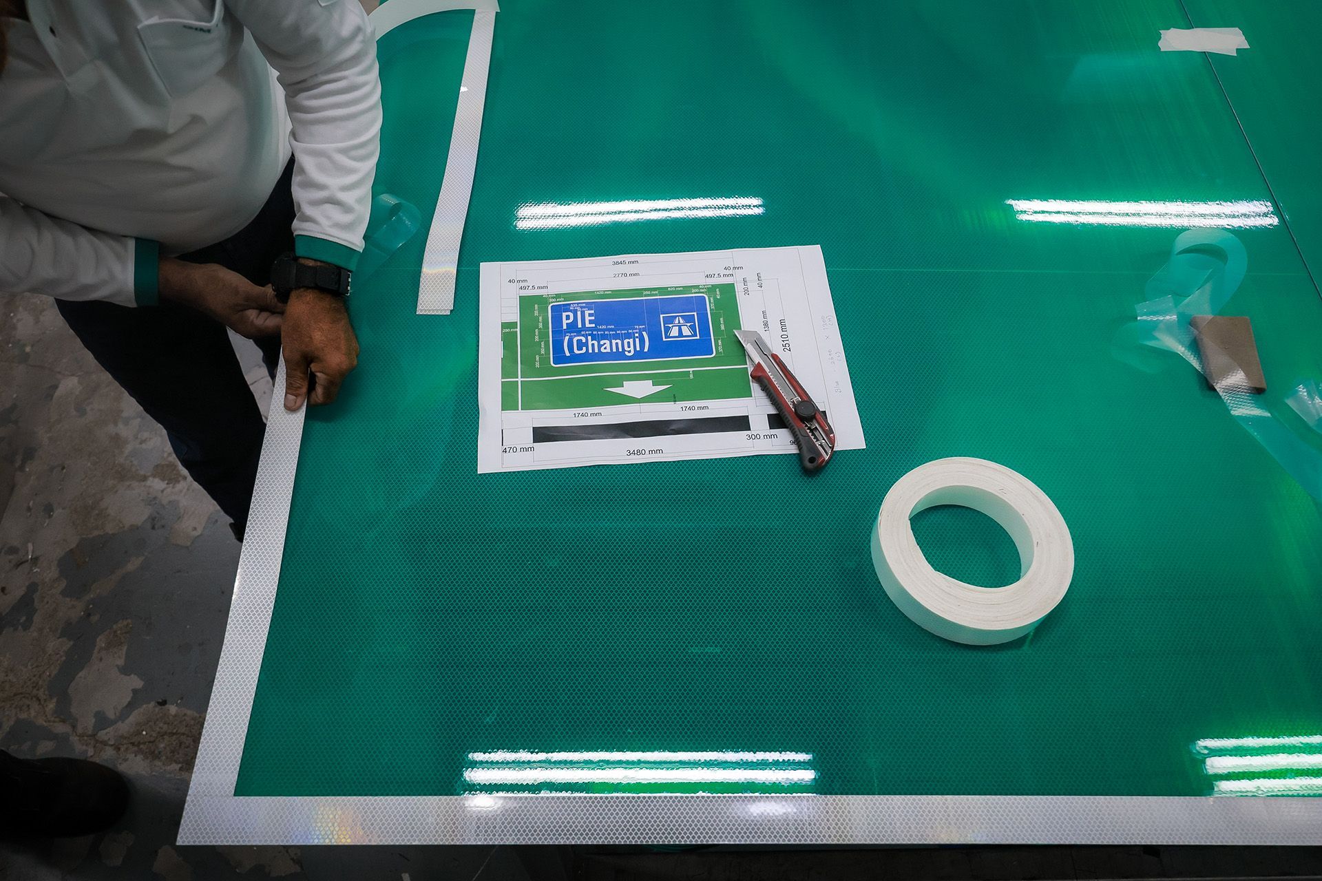 Sign letterings in different coloured backgrounds.